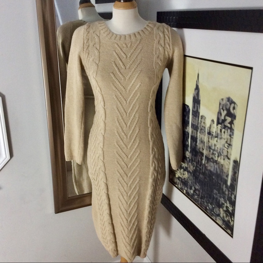 Long sleeve tan cable knit sweater dress.